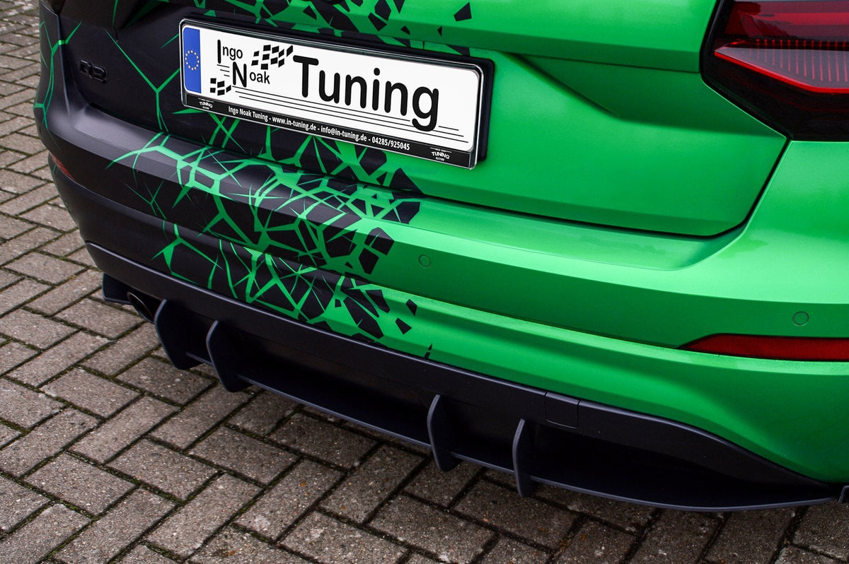 Bodykit für Audi Q2 GA 2016-2020 von Ingo Noak Tuning, komplett mit Stoßstangen und Seitenschweller, in Schwarz.