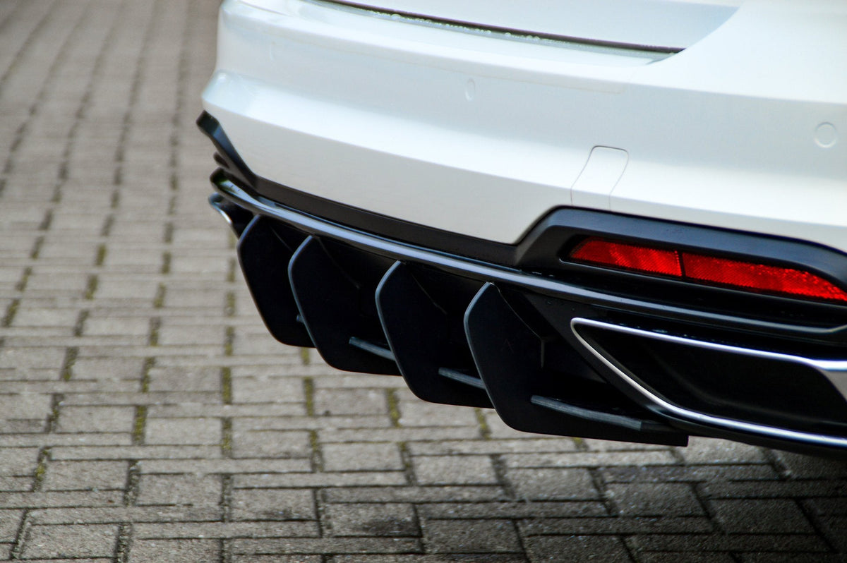 Gefräster Heckansatz aus ABS für Audi A4 B9 Avant Facelift, in schwarz, von Ingo Noak Tuning, zeigt das aerodynamische Design